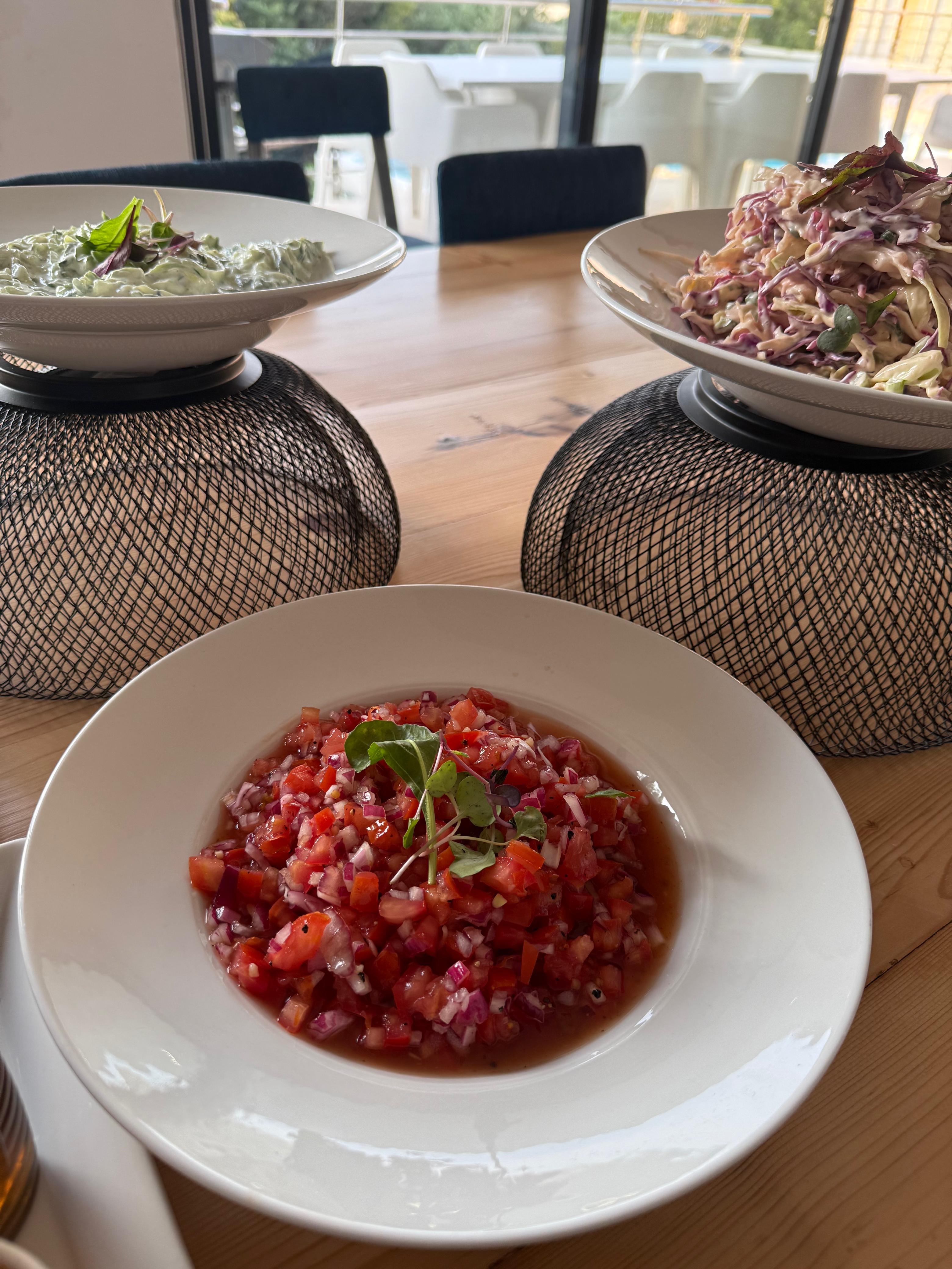 Professional buffet setup with multiple gourmet food stations